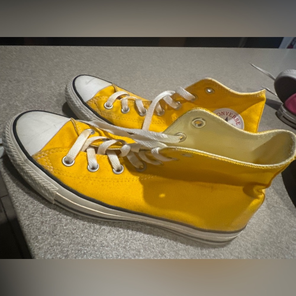 Yellow high top converse